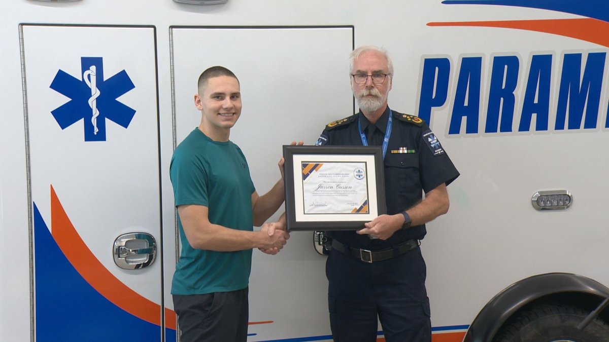 Jarren Cusson receives the Chiefs Life Saving Award during the Martensville Ambulance Base opening ceremony.