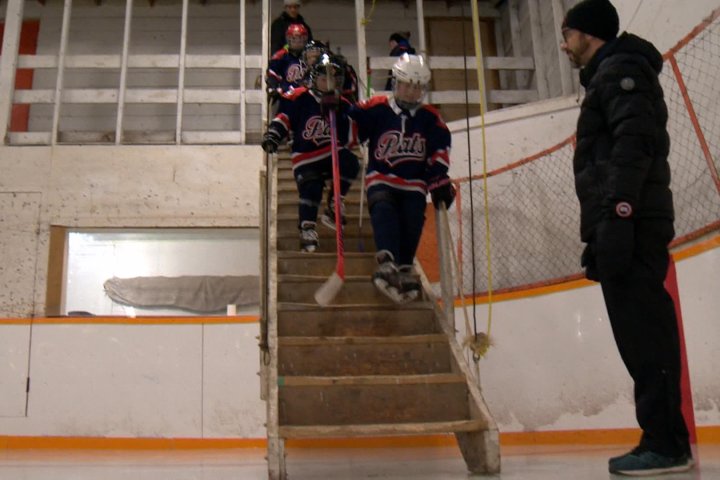 Players descend stairs at Lang’s hockey rink to skate on some of Sask.’s oldest ice