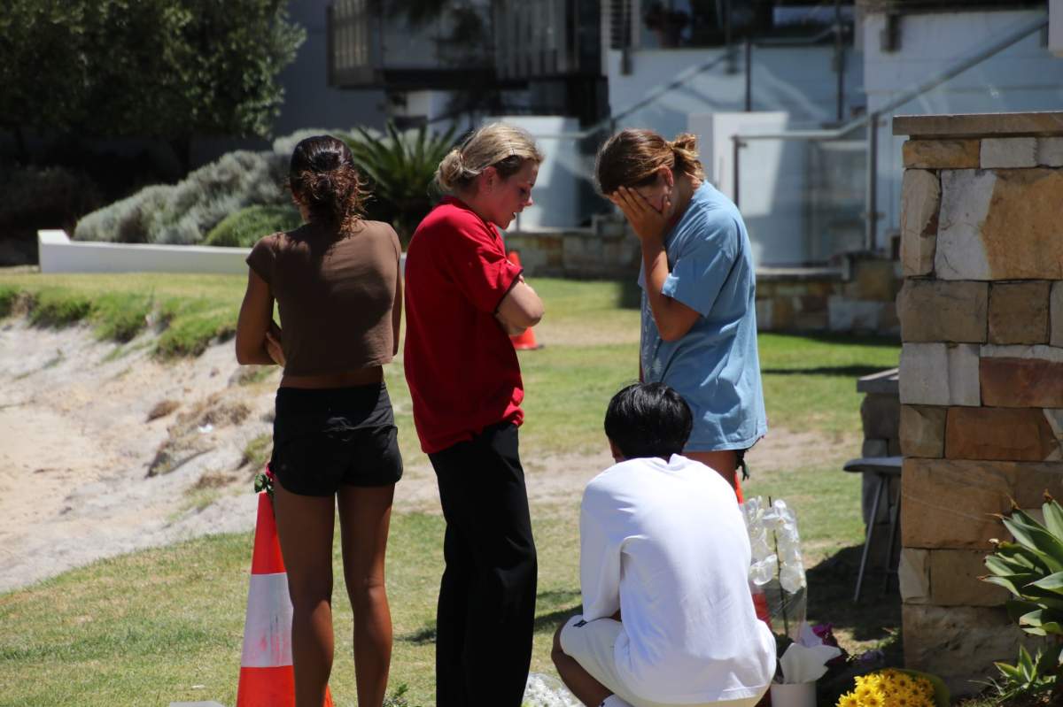 Friends and loved ones of Stella Berry gathered on the banks of the Swan River Sunday to mourn the loss of the 16-year-old. Berry died after being attacked by a shark while swimming.