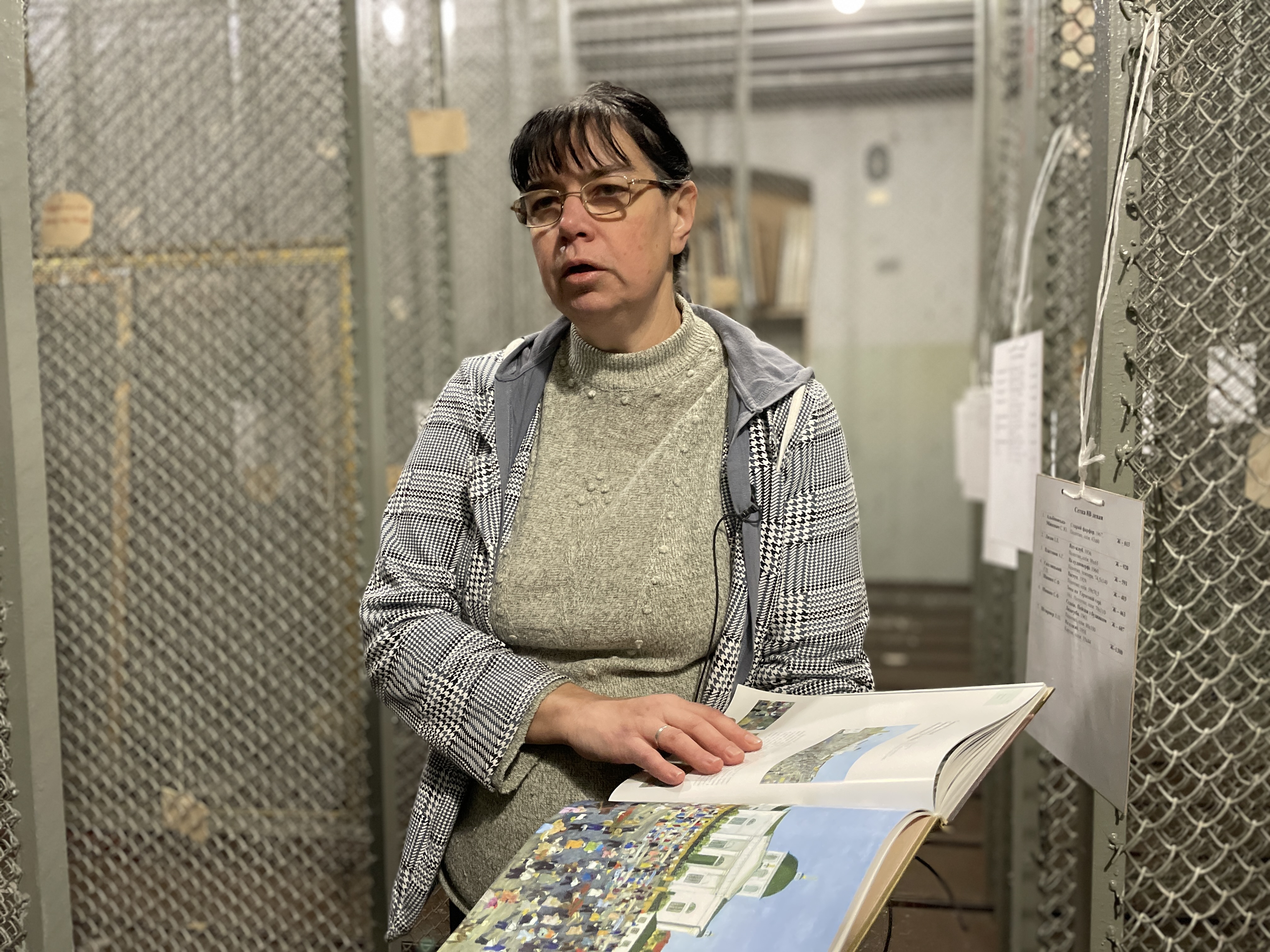 Hanna Skrypka, deputy director of the Kherson Art Museum, in an empty storage room looted by Russian forces.