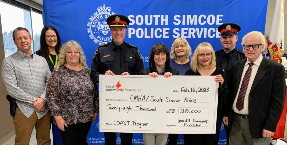 Pictured, from left, are South Simcoe Police Service Constable Mike Kayser, Sheena Garwood, Canadian Mental Health Association Simcoe County Crisis Services, Kerry Dault, Canadian Mental Health Association Simcoe County Crisis Services, Chief John Van Dyke, Anne Smith, treasurer for the Innisfil Community Foundation,  Anne Kell, president and secretary with the Innisfil Community Foundation, Sandra Rizzardo, Chair of the Innisfil Community Foundation, Sergeant Steve Black, Pastor Howard Courtney, vice-chair of the Innisfil Community Foundation.