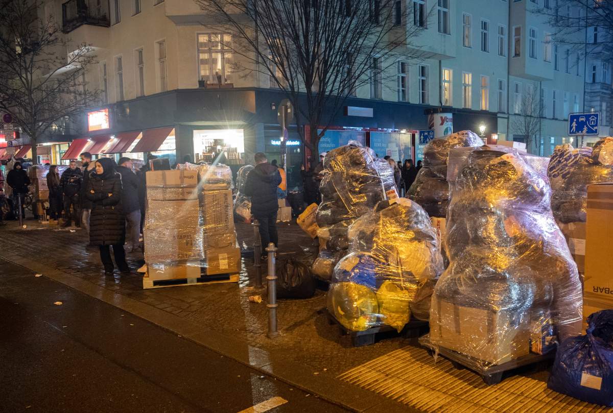 Relief supplies are packed on the side of a street in Germany.