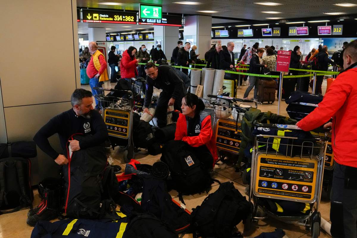 Spanish firefighters with their equipment at Barajas international airport, in Madrid, Spain,