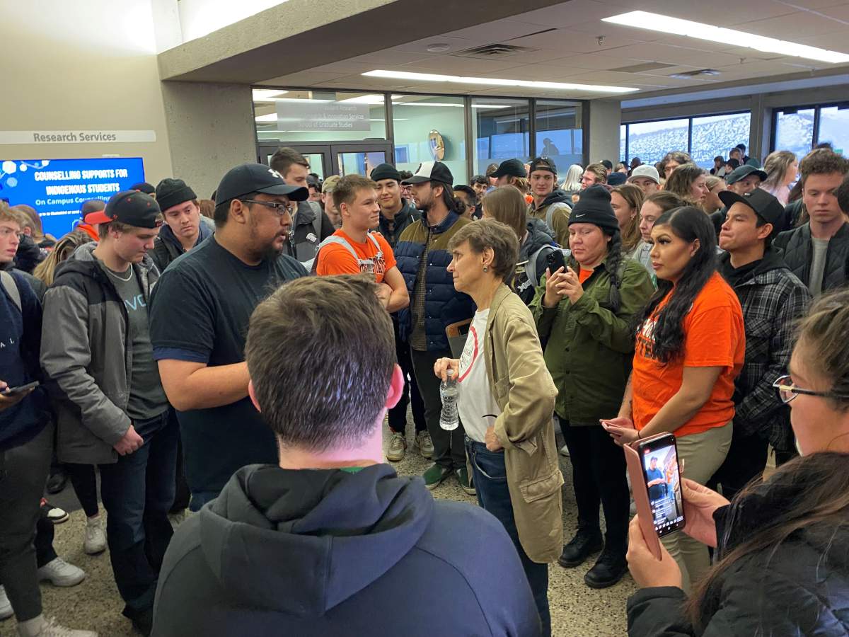 Frances Widdowson speaks with someone at the University of Lethbridge. She was planning to give a lecture, but was met with resistance. Taken Feb. 1, 2023.