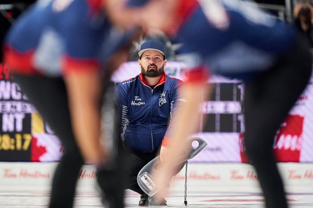 Wild Card Team 2 skip Reid Carruthers of the Morris Curling Club in Manitoba watches his shot during his team's match against the Northwest Territories at the 2023 Tim Hortons Brier at Budweiser Gardens in London, Ont., Sunday, March 5, 2023.&nbsp;Carruthers outscored Jamie Koe of the Northwest Territories 11-7 on Sunday at the Tim Hortons Brier. 