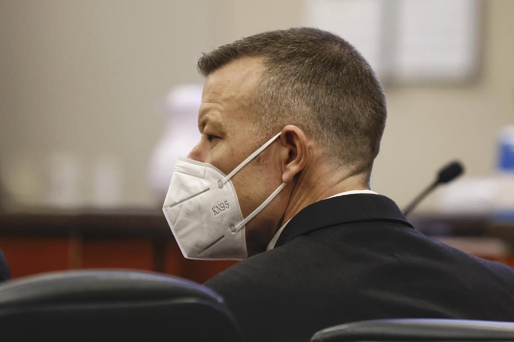 Paul Flores listens during his murder trial