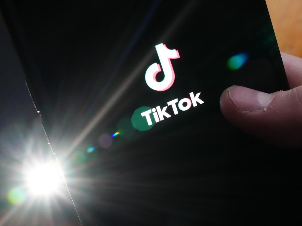 The TikTok startup page is displayed on an iPhone in Ottawa on Monday, Feb. 27, 2023.