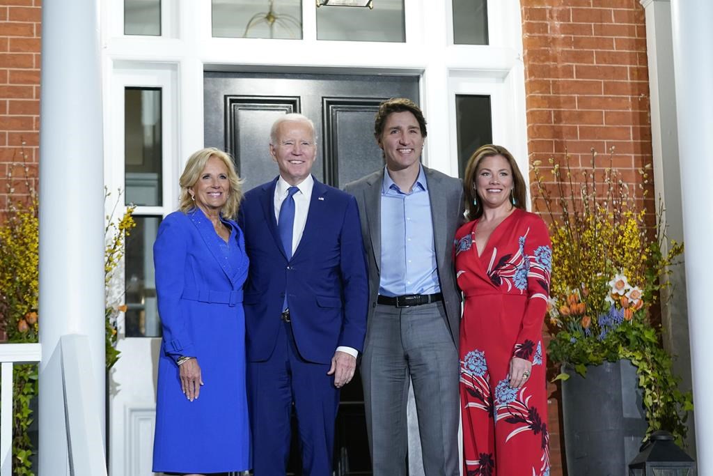 President Joe Biden and first lady Jill Biden pose for photos with Canadian Prime Minister Justin Trudeau and his wife Sophie Gregoire Trudeau at Rideau Cottage, Thursday, March 23, 2023, in Ottawa, Canada. (AP Photo/Andrew Harnik)