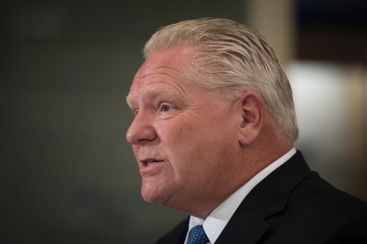 Ontario Premier Doug Ford answers questions following a press conference at a Shoppers Drug Mart pharmacy in Toronto, Wednesday, Jan. 11, 2023. Ford says voters in Toronto's upcoming mayoral byelection should not support anyone who wants to defund the police. 