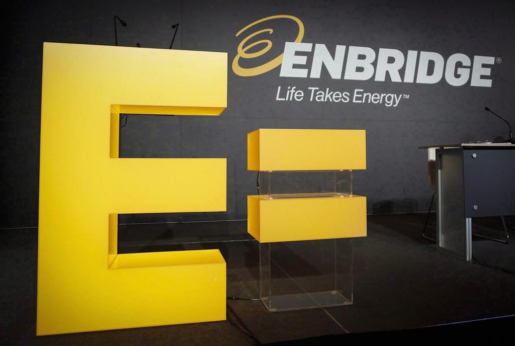 Enbridge company logos on display at the company's annual meeting in Calgary, Thursday, May 12, 2016. Enbridge Inc. says it has signed a letter of intent with Yara Clean Ammonia to jointly develop a blue ammonia production facility at the Enbridge Ingleside Energy Centre near Corpus Christi, Texas.