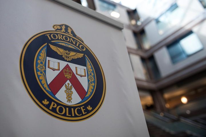 A Toronto Police Services logo is shown at headquarters, in Toronto, on Friday, August 9, 2019.Toronto police say they are investigating a possible hate crime after graffiti appeared on the walls of a mosque in the city.&nbsp;.