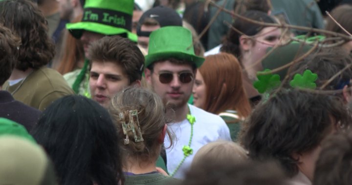 Queen’s University students fill Aberdeen Street in celebration of St. Patrick’s Day