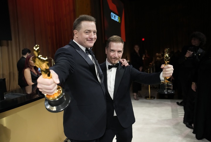 Brendan Fraser, winner for best performance by an actor in a leading role, left, and Adrien Morot, winner for best makeup and hairstyling, both for "The Whale," pose at the Governors Ball after the Oscars on Sunday, March 12, 2023, at the Dolby Theatre in Los Angeles. 