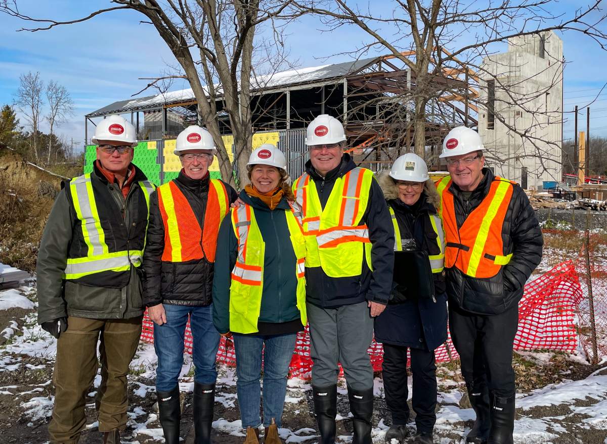 Museum curator Jeremy Ward, from left, fundraising cabinet volunteer Rodger Wright, executive director Carolyn Hyslop, donor Stu Lang, landscape architect Helen Batten with Basterfield & Associates Ltd. and fundraising cabinet volunteer David Hadden visit the museum’s future home under construction.