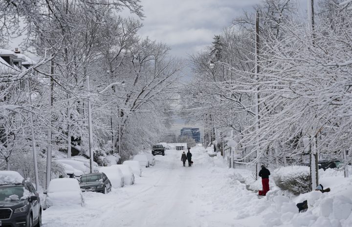 A snow covered street is seen following a snow storm on Saturday, March 4, 2023. Environment Canada has issued a winter storm advisory for much of southern Ontario. 