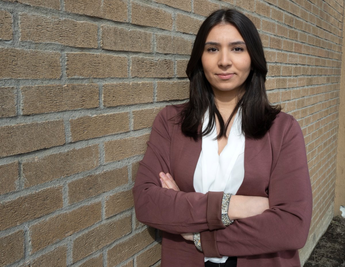 Miriam Ikhlef poses for a photo Thursday, March 9, 2023  in Montreal. Ikhlef was fired from the 911 call centre and had her application denied to become a Montreal police officer for security reasons.