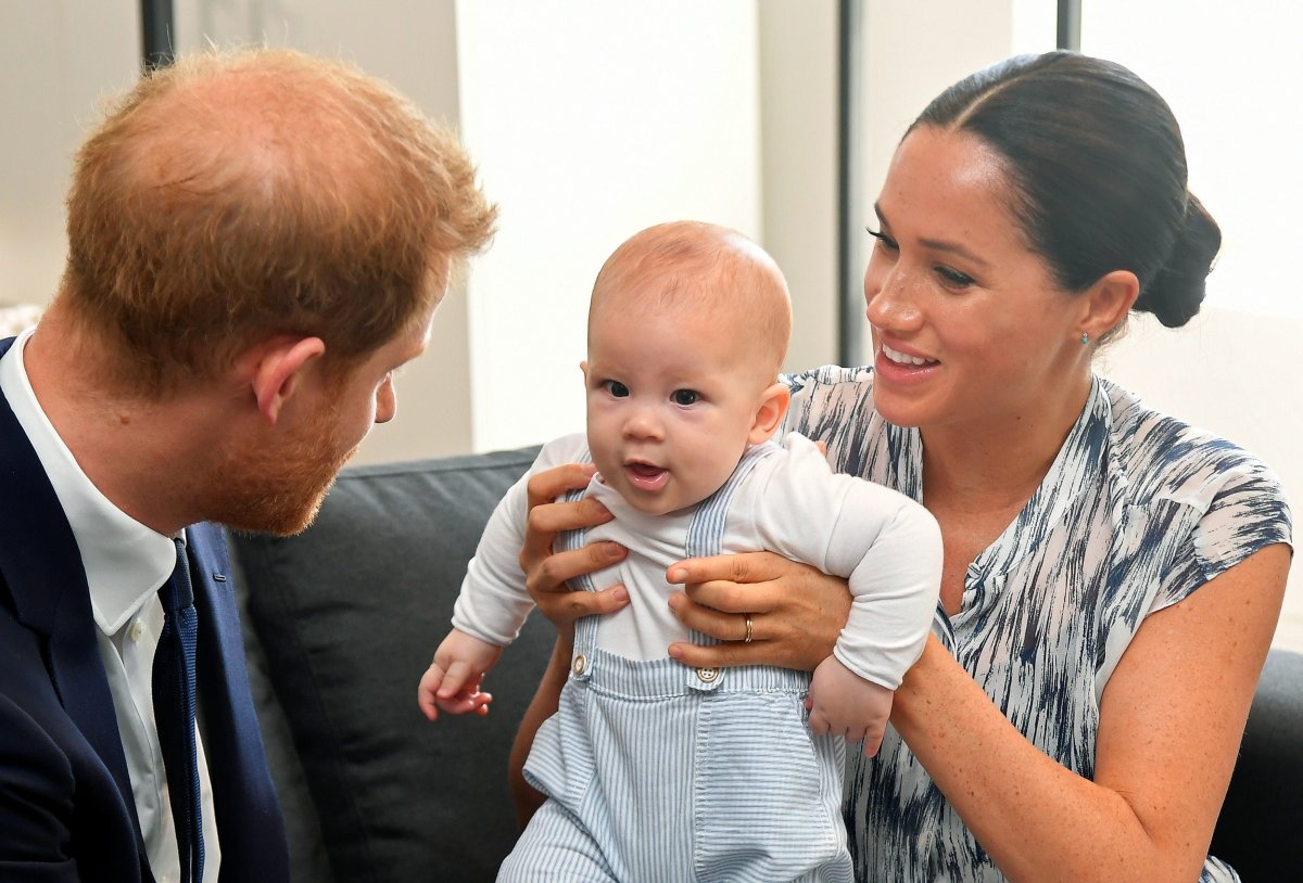 The Duke and Duchess of Sussex holding their son Archie during a meeting with Archbishop Desmond Tutu and Mrs Tutu at their legacy foundation in Cape Town, on day three of their tour of South Africa.