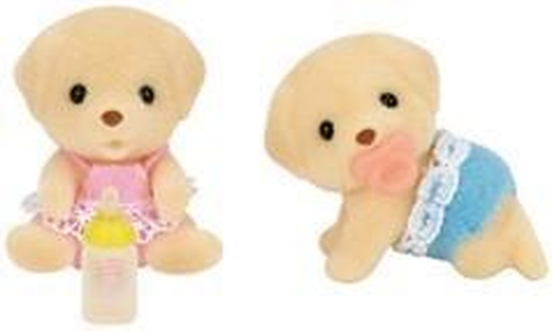 Yellow Labrador Calico Critter twins with the recalled bottle accessory in yellow and recalled pacifier accessory in pink.