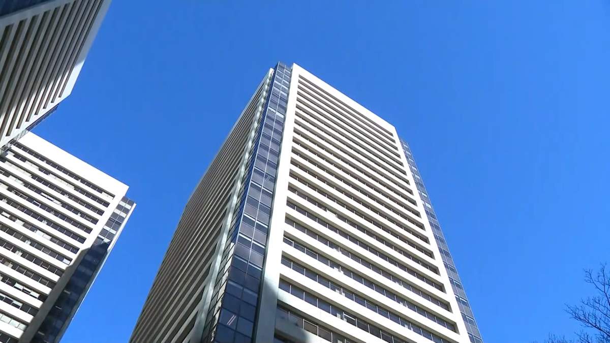 The Ampersand building in downtown Calgary is pictured on March 2, 2023. The fire department was called in after piece of metal flashing was seen hanging from the roof.