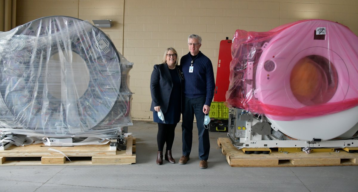 (L to R) Heather Gillis, RVH Director of Operations for Medical Imaging, Pathology and Laboratory Medicine and David Wilson, RVH Manager of Imaging Services, stand next to components of RVH’s new PET-CT scanner.