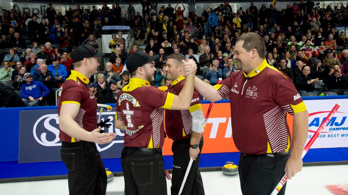 Nunavut skip Jake Higgs from Strathroy, Ont., shakes hands with teammate Brady St Louis after making history by capturing Nunavut’s 1st ever Brier win at Budweiser Gardens on March 4, 2023. Curling Canada/ Michael Burns Photo