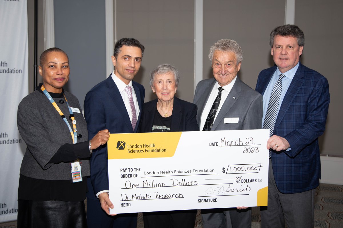 Left to right, Dr. Jackie Schleifer Taylor, Dr. Saman Maleki, Helen and Andy Spriet and John MacFarlane pose after the announcement of a $1 million donation to help expand cancer treatment.