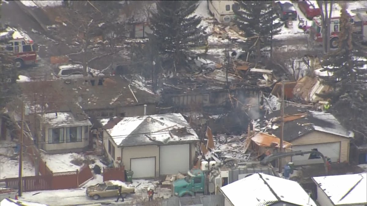 The aftermath of a house explosion in northeast Calgary is seen on March 27, 2023.