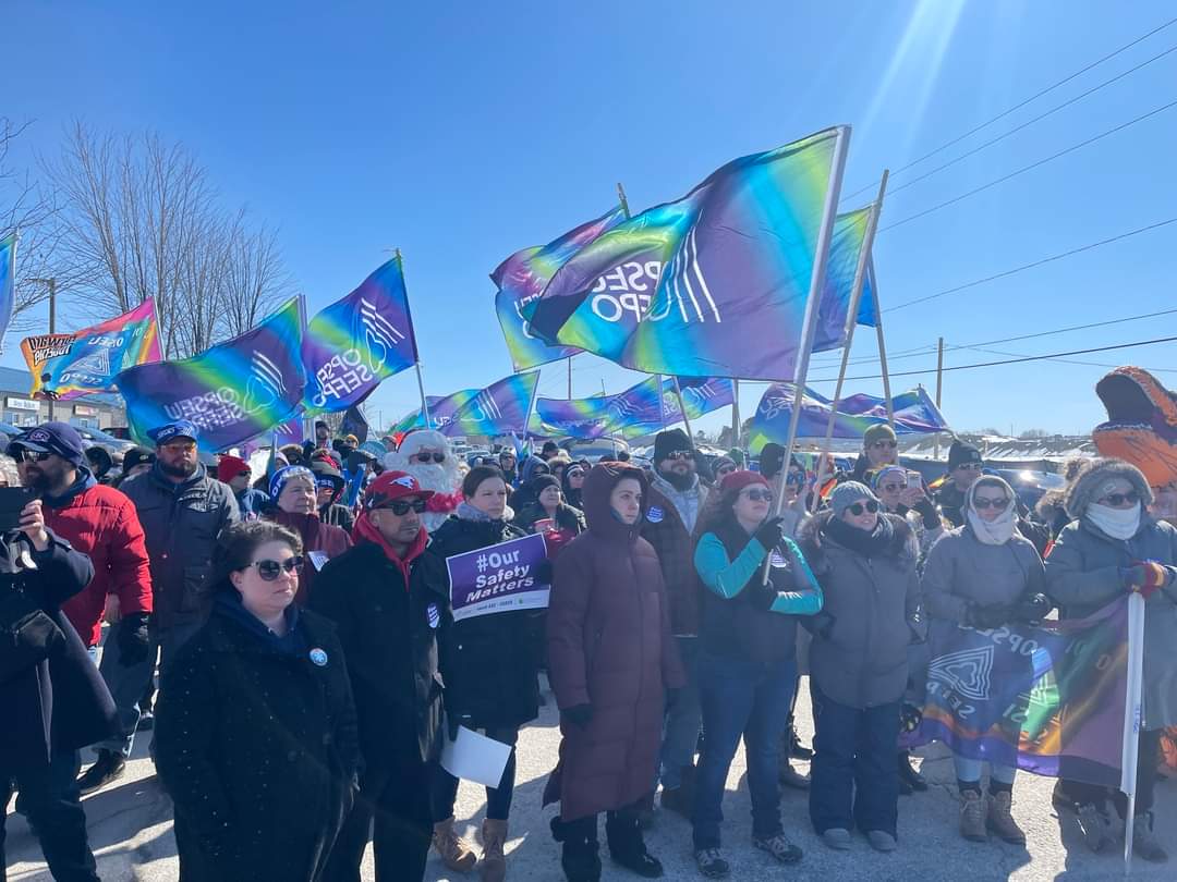 On Tuesday, March 7, 2023, over a hundred OPSEU union members gathered outside the Community Living Association of South Simcoe facility in Allston to protest the firming of three workers. 