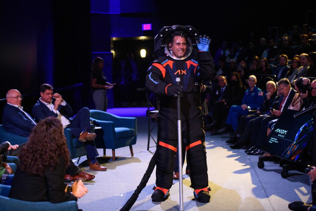 Chief Engineer Jim Stein wears the new spacesuit during the Axiom Space Artemis III Lunar Spacesuit event at Space Center Houston in Houston, Texas, on March 15, 2023.