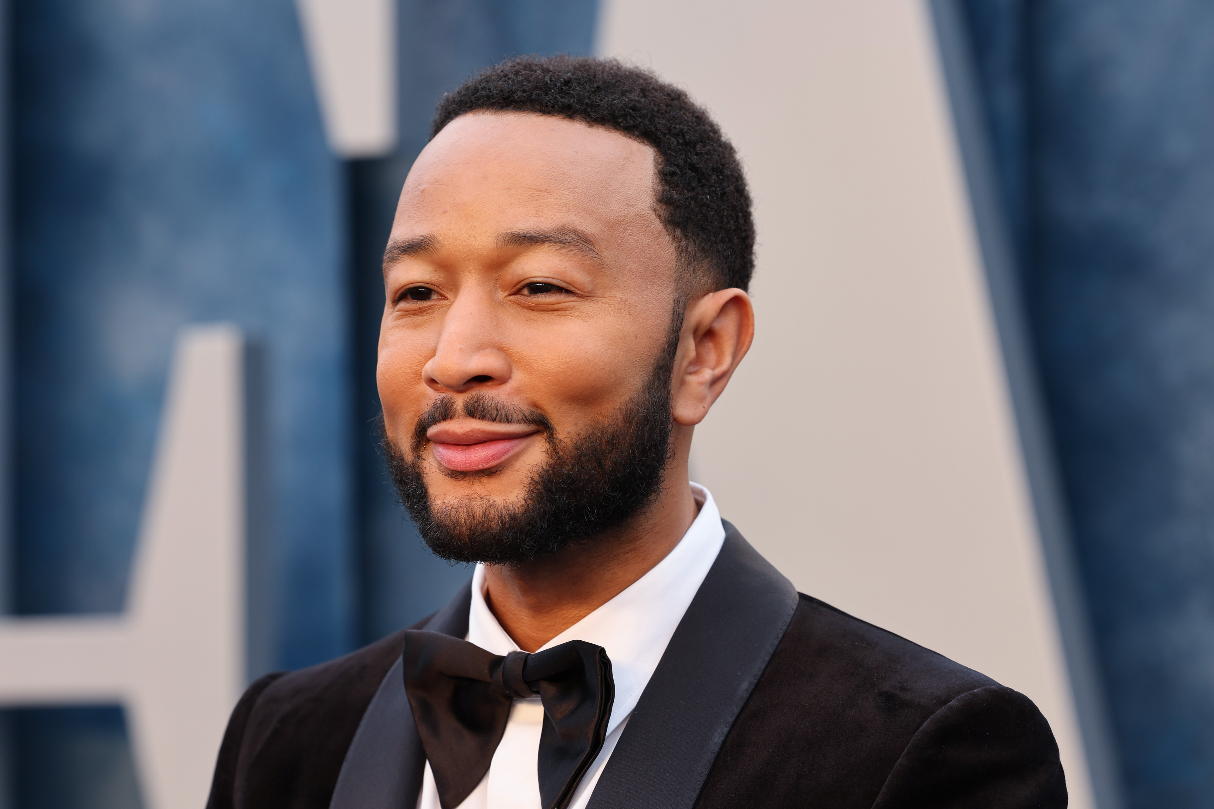 John Legend reacts after learning he provided the soundtrack to Emily  Ratajkowski and Harry Styles kissing