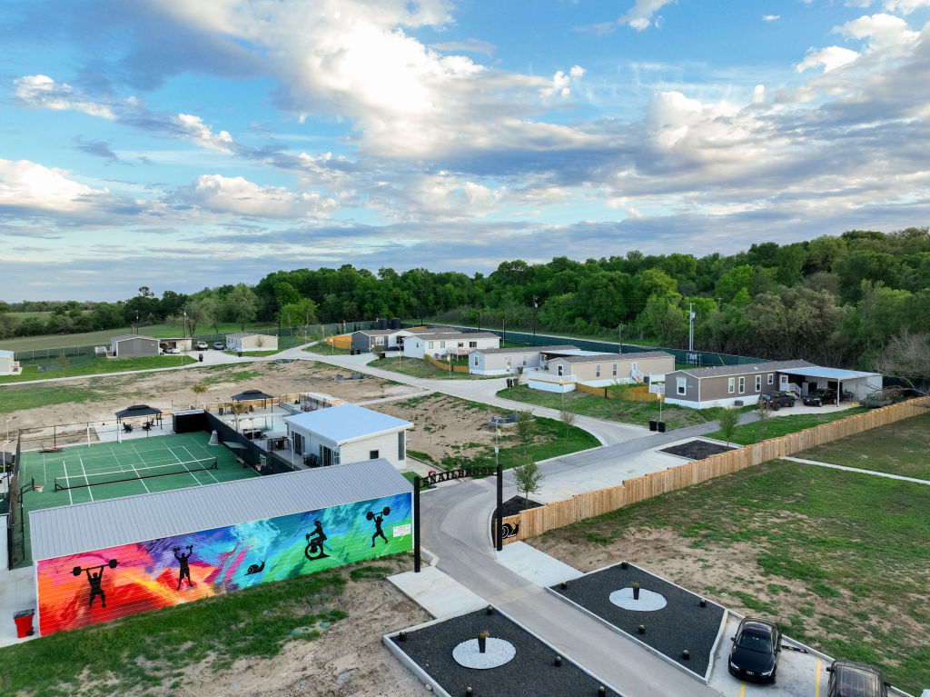 An aerial view of Elon Musk's Snailbrook community under construction on March 13, 2023 in Bastrop County, Texas. Elon Musk has reportedly bought thousands of acres of land in a plan to build a town where employees could live and work.