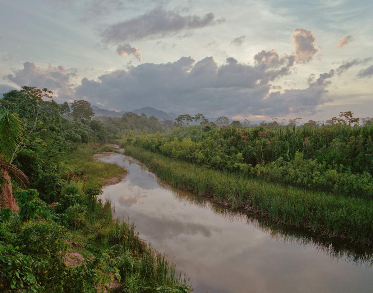 A dramatic sunset in the jungle of Northern Bolivia, off of the Beni River.