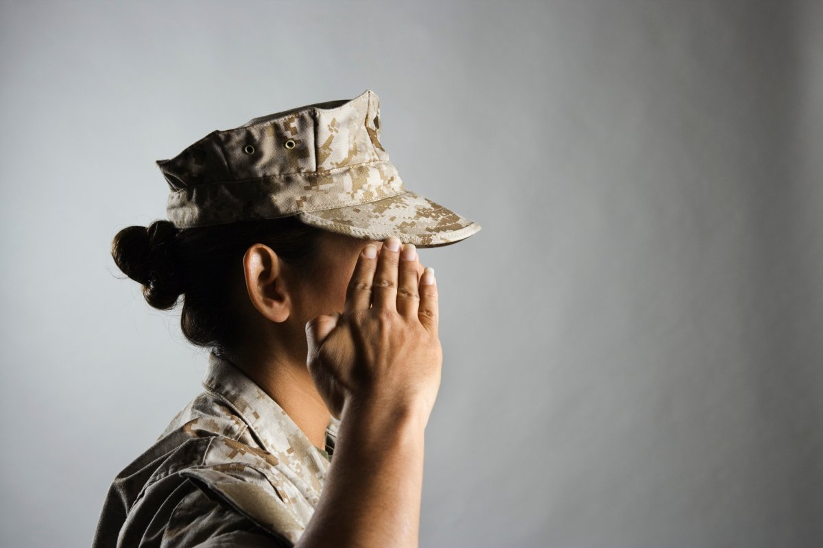 File - profile of a U.S. Marine saluting.