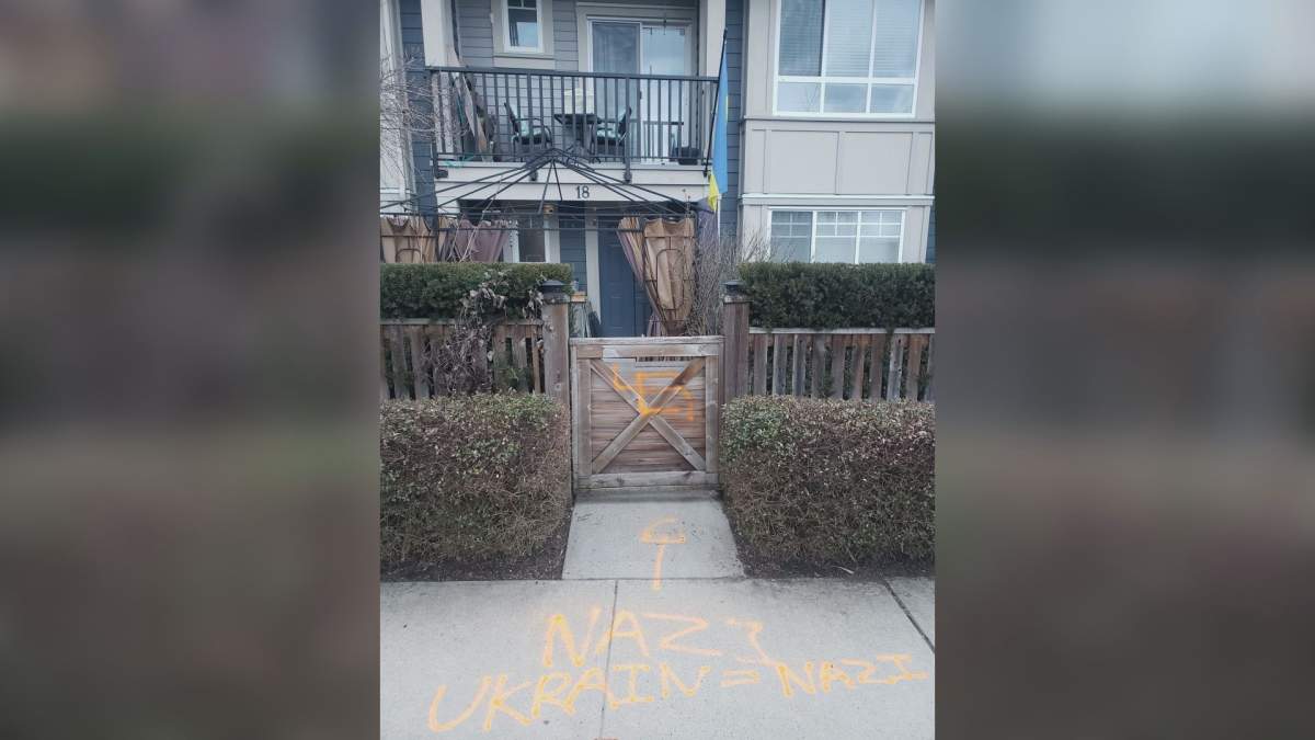 What appears to be a failed attempt at a Nazi symbol, was spray painted on the family’s gate on March 9.