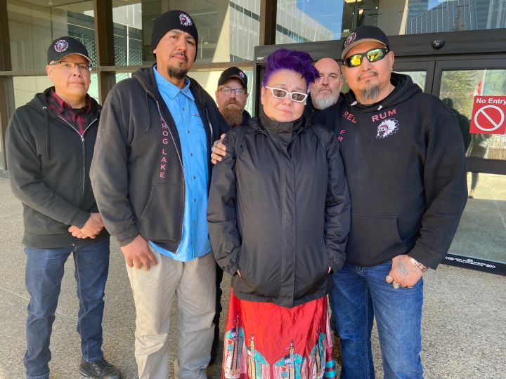 Marless Johnson is seen outside the Edmonton Law Courts with some supporters on March 20, 2023. She was there for the first day of a trial for the man accused of manslaughter in the death of her daughter, Billie Johnson.
