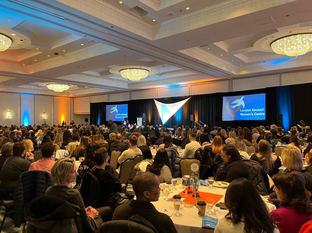 London Abused Women's Centre executive director Jennifer Dunn addresses a crowd gathered inside the DoubleTree by Hilton Hotel during Friday's event.