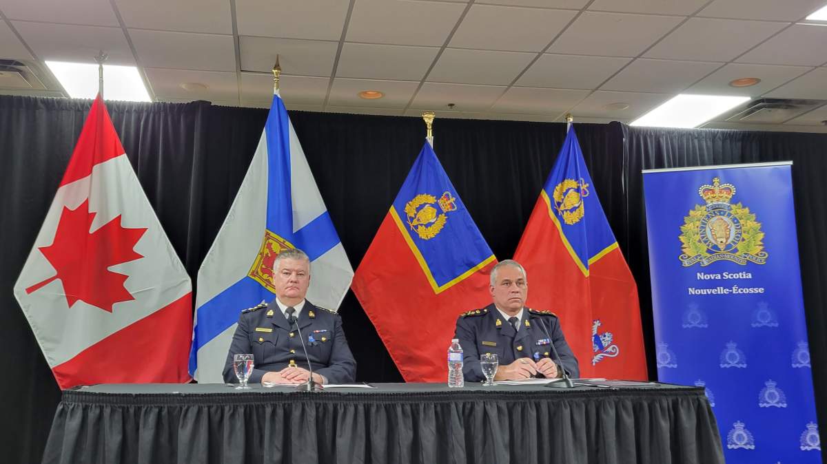 Dennis Daley, the commanding officer of the Nova Scotia RCMP and interim RCMP Commissioner Mike Duheme speak at a new conference following the release of the Mass Casualty Commission report on March 30, 2023.
