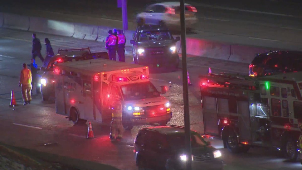 Emergency responders on the scene of a fatal pedestrian hit and run along Calgary's Deerfoot Trail, on Jan. 24, 2023.