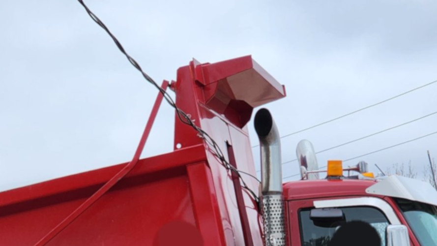OPP closed Norfolk County Road 19 on Mar. 27 2023 after a dump truck struck some hydro wires. 