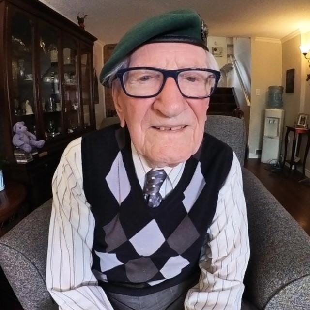 Former Commando Tom Boneham wearing a beret for the first time since he was shot in 1943.