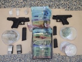 Waterloo police seized a number of drugs and weapons at a Toronto home.