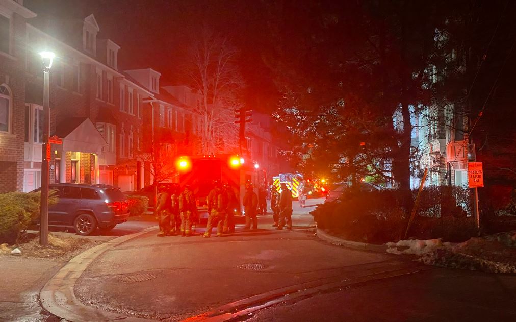 Firefighters at a fire on Brussel Street in Etobicoke on March 23, 2023.