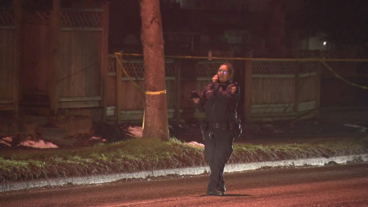 A VPD officer was seen outside of the home where a reported homicide took place, Saturday.