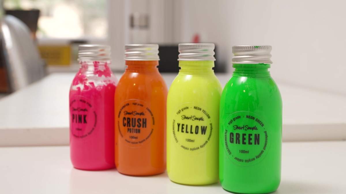Bottles of Semple's branded paints.
