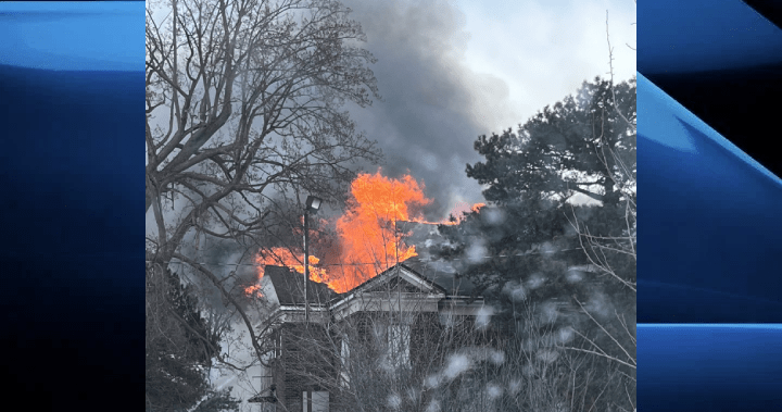 Fire officials tweeted about the blaze on Highbury Avenue shortly after 6 p.m. They say the structure was heavily burned and the roof had fallen.
