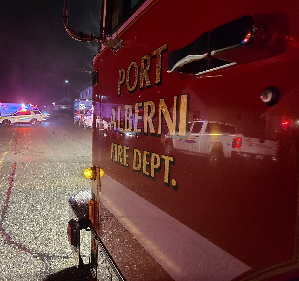 Firefighters and police respond to one of two fires they believe were deliberately set in Port Alberni on Wednesday evening. 