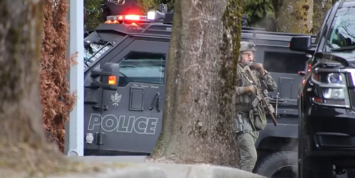 The Lower Mainland Emergency Response Team seen at a weapons call in Surrey on Thursday. 