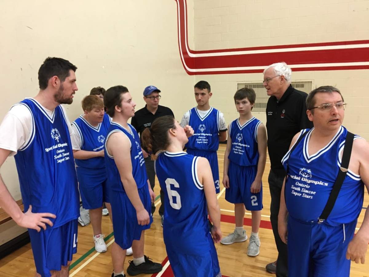 James Richardson, 72, working with the South Simcoe Special Olympics basketball team.