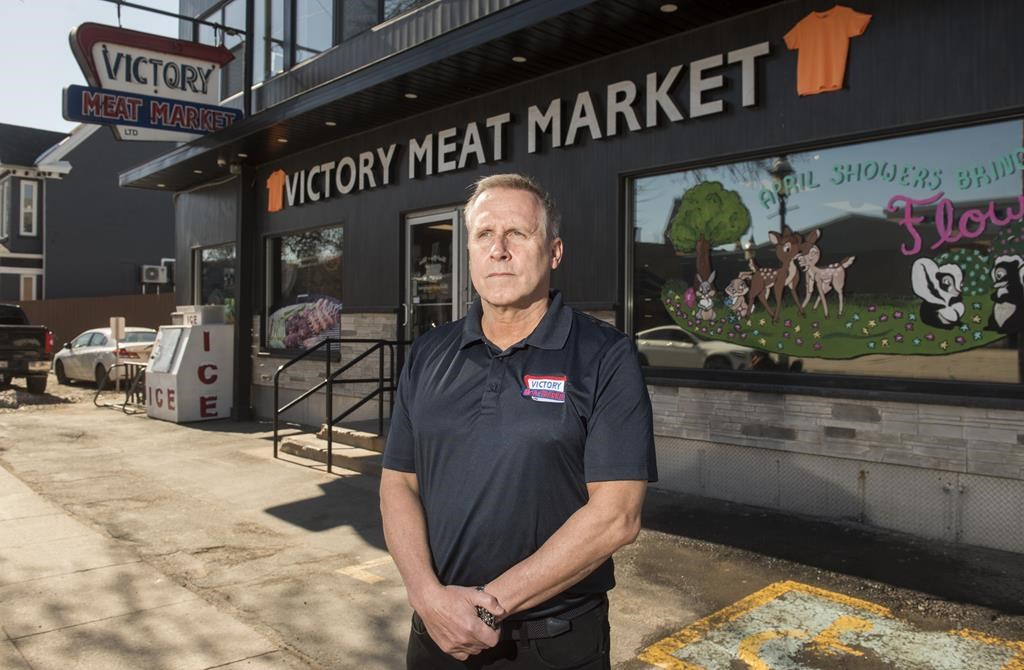 Alex Scholten, co-owner of the Victory Meat & Produce Market Ltd., is shown at his store in Fredericton, Monday, April 10, 2023. For 81 years, the independent store has offered quality products at affordable prices, earning it a loyal customer base despite the increasing dominance of grocery stores chains.