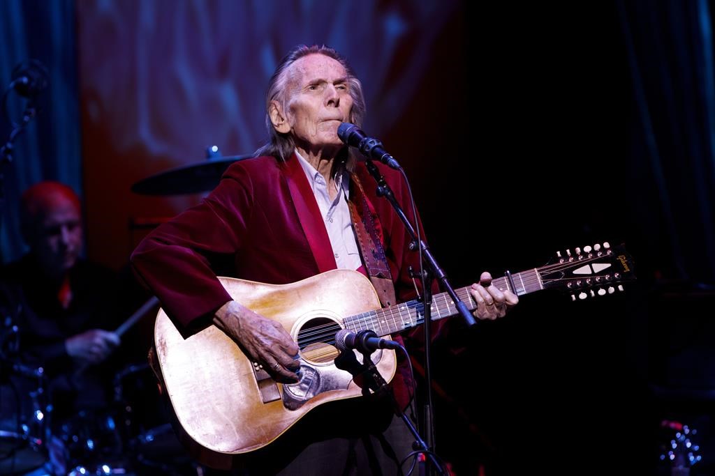 Gordon Lightfoot performs during the first concert at the newly re-opened Massey Hall in Toronto, Thursday, Nov. 25, 2021.  THE CANADIAN PRESS/Cole Burston.